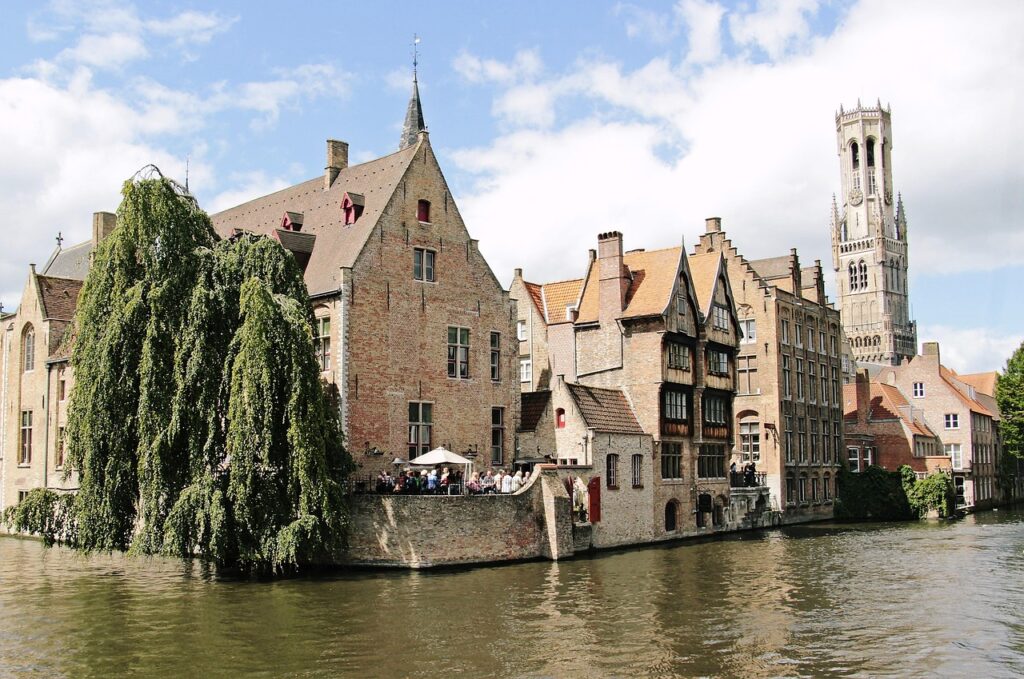 tower, canal, channel, belfry, bruges, historically, places of interest, historic center, idyllic, facades, architecture, medieval city, water, city, river, picturesque, belgium, structures, waterways, construction art, culture, beautiful, nature, city view, romance, tourism, old, old town, masonry, sky, old buildings, bridge, stone bridge, summer, trees, building, antique, ancient building, middle ages, stone wall, world heritage, unesco, unesco world heritage, cultural monument
